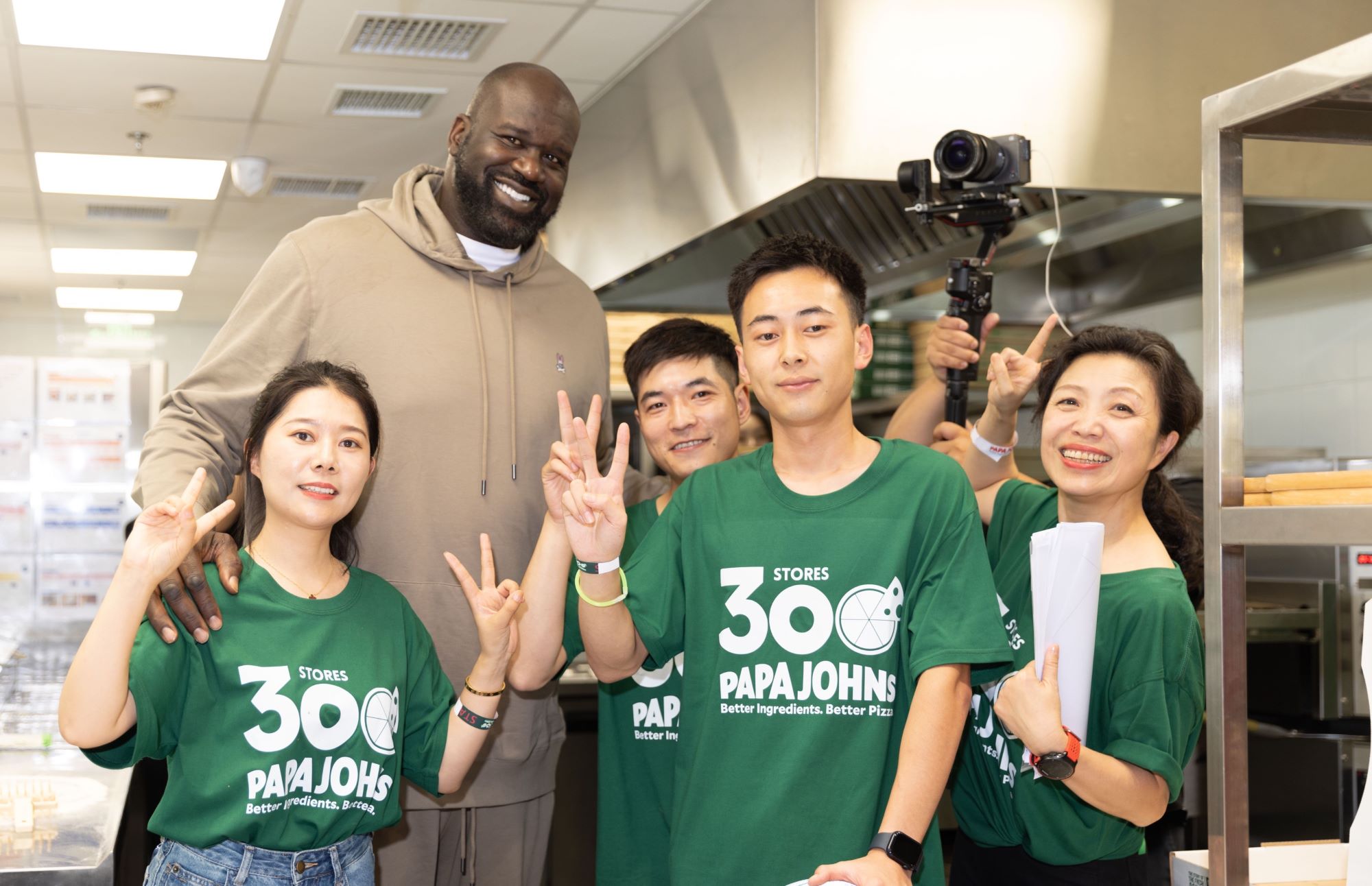 Shaq helps open 300th Papa Johns restaurant in China