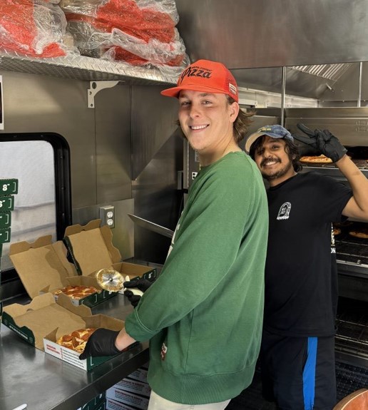 Team members working in the mobile kitchen 