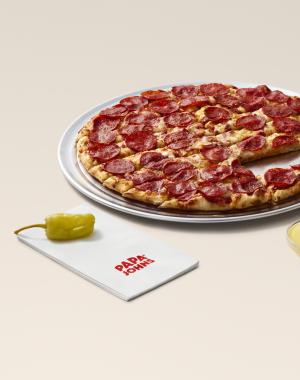 Pizza and four garlic dipping sauces