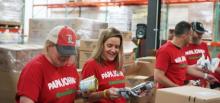 Papa Johns team members volunteer at food bank