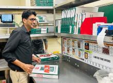 Yasir Hussain inside one of his Papa Johns restaurants