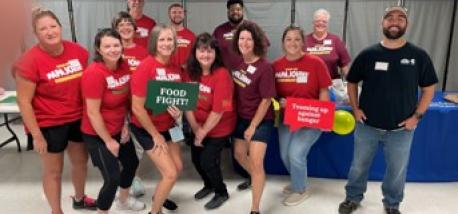 Louisville team members participate in Dare to Care’s National "Food Fight" Volunteer Day 